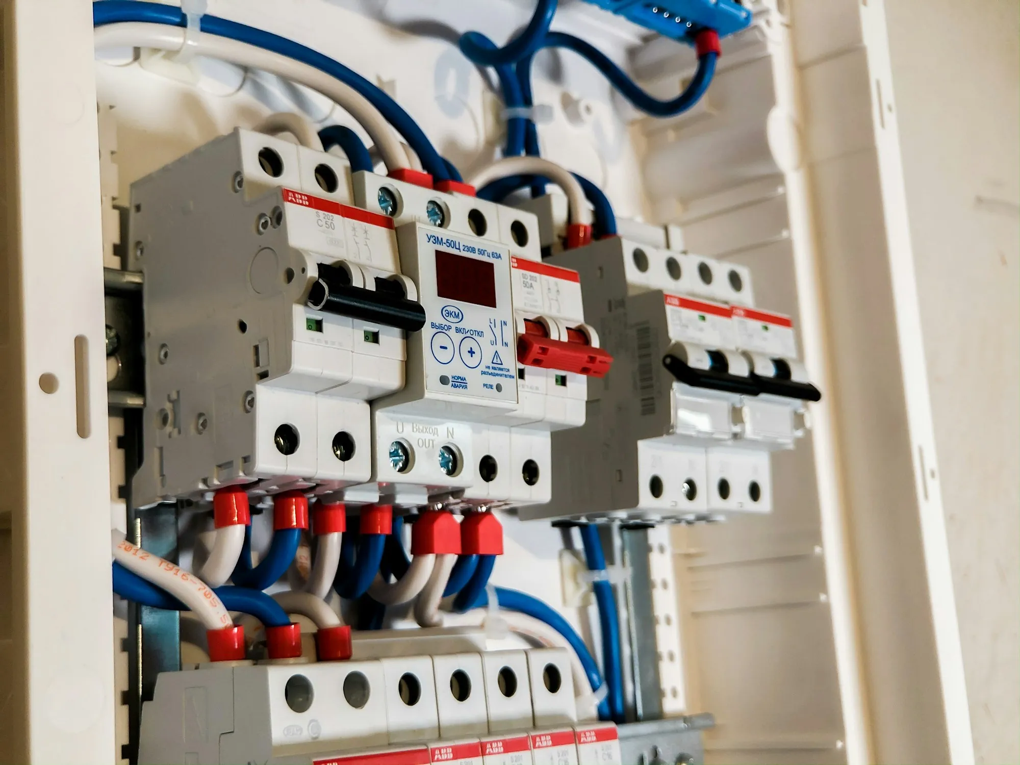 Open electrical panel with new breakers and neatly dressed wires